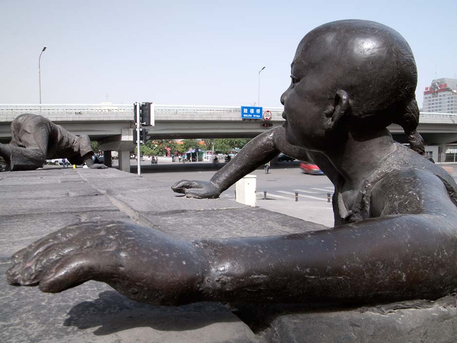 Bronze Statues of Climbing Boys Outside a Subway Station, Beijing