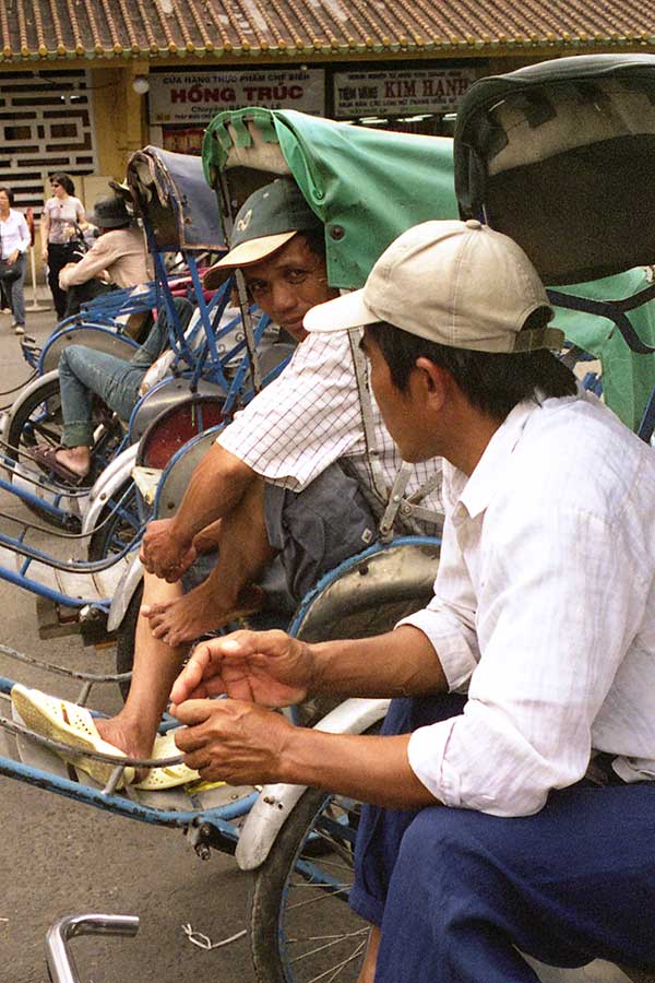 Cyclo Taxi Drivers Waiting For Fares in Saigon, Viet Nam