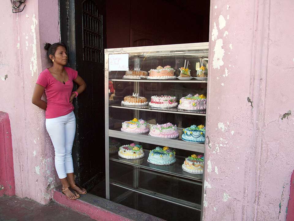 Girl Selling Cakes in Leon, Nicaragua