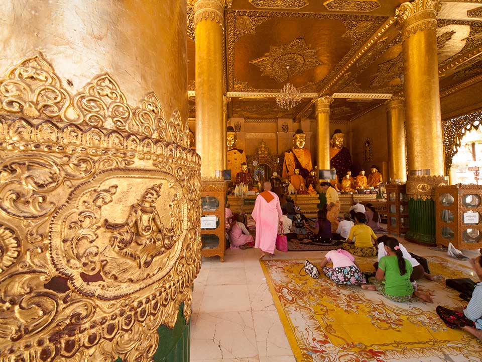 Worshipers at Shwedagon Paya, Yangon, Myanmar